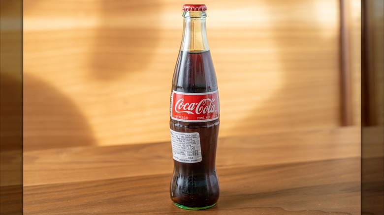 Mexican Coca Cola on wooden table
