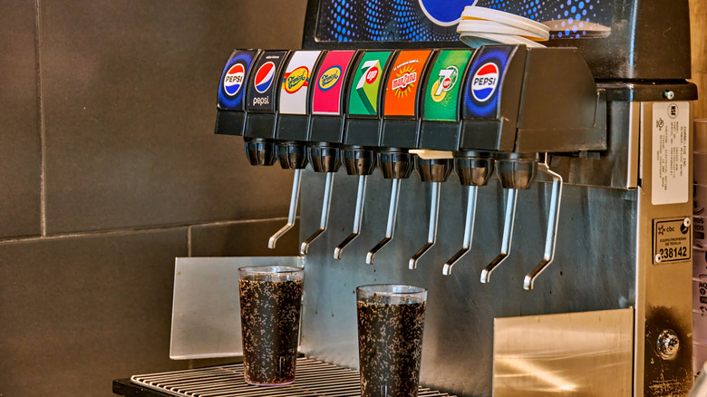 Pepsi soda fountain machine featuring various soda options.