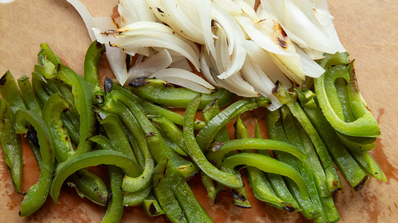 sliced cooked green peppers and onions
