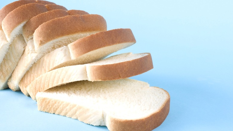 A sliced loaf of white bread.
