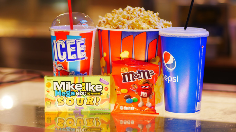 Assortment of movie theater snacks and drinks