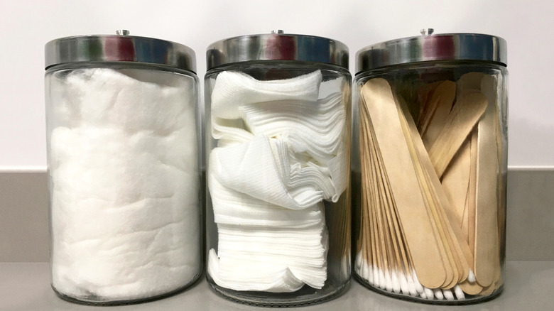 Cosmetic products in glass jars