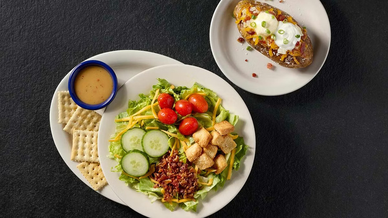 A top-down view of the salad lunch special from Cracker Barrel on a black surface