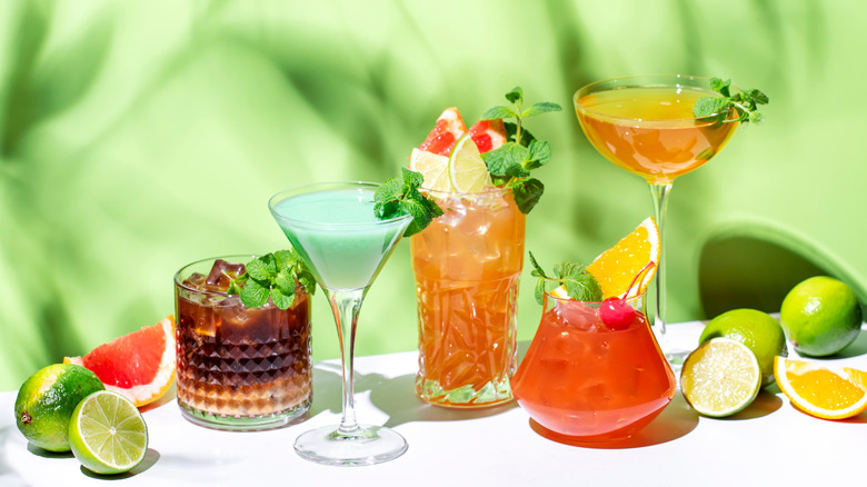 Assorted cocktails garnished with mint