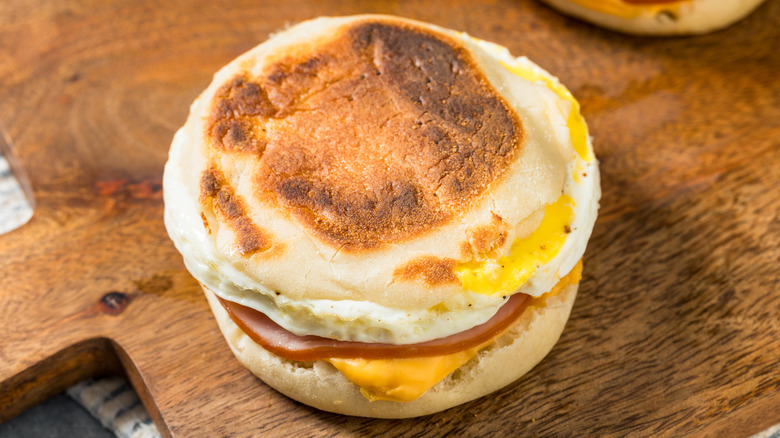 A closeup of an egg sandwich on an English muffin
