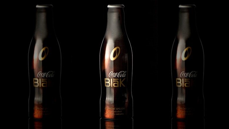Product shot of Coca-Cola Blak in a dark bottle