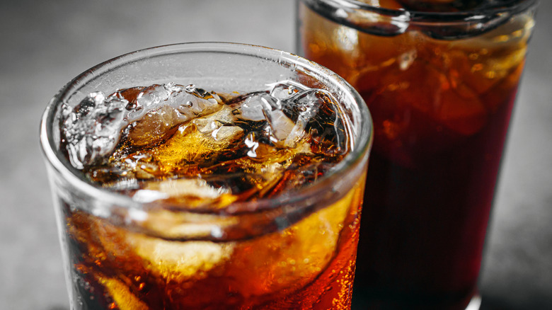 Two glasses of cola with ice
