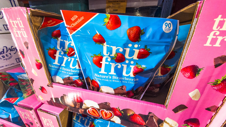 Bags of TrüFrü frozen chocolate-covered strawberries