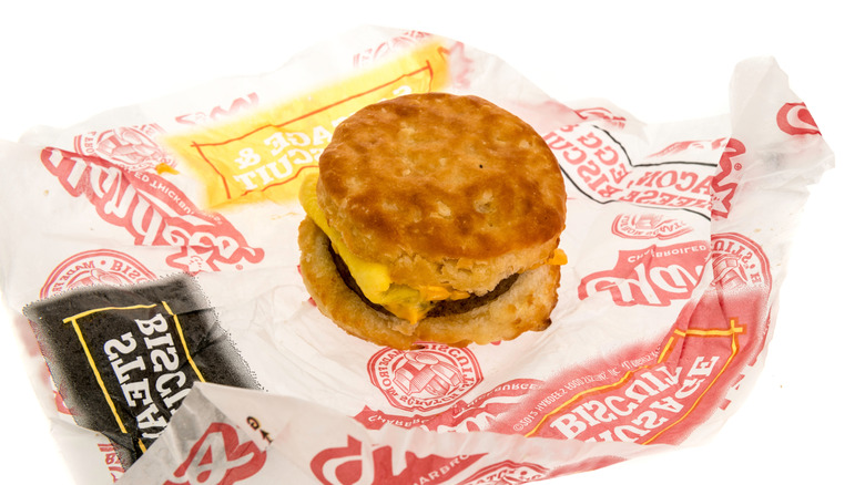 A biscuit breakfast sandwich on a Hardee's wrapper