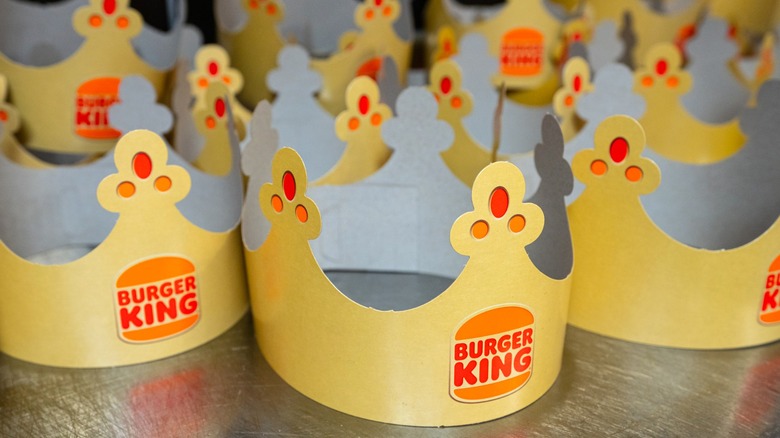 Cardboard Burger King crowns sitting on countertop