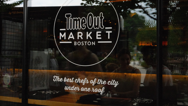 A window graphic outside Time Out Market Boston