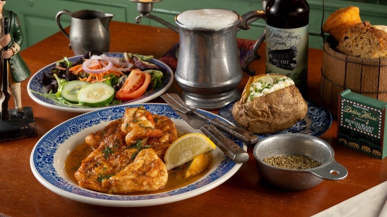 A meal of chicken, salad, and a baked potato at Dobbin House Tavern