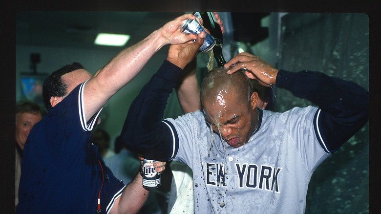 New York Yankees celebrating with beer in a locker room