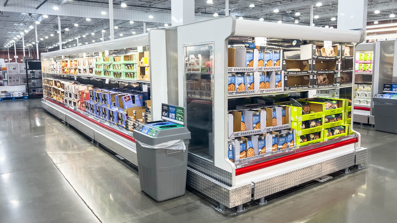 Costco refrigerated island section with goods on display.