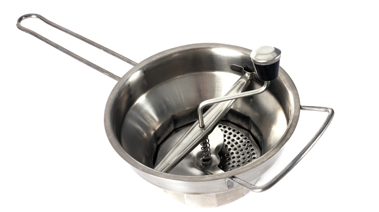 An assembled food mill