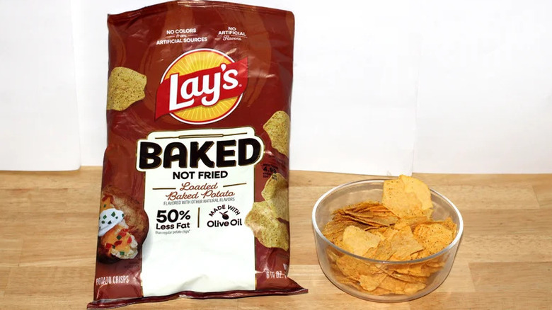Bag and bowl of Lay's Baked Loaded Baked Potato chips