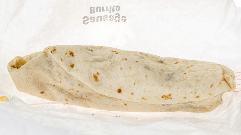 McDonald's Sausage Burrito in its paper wrapper