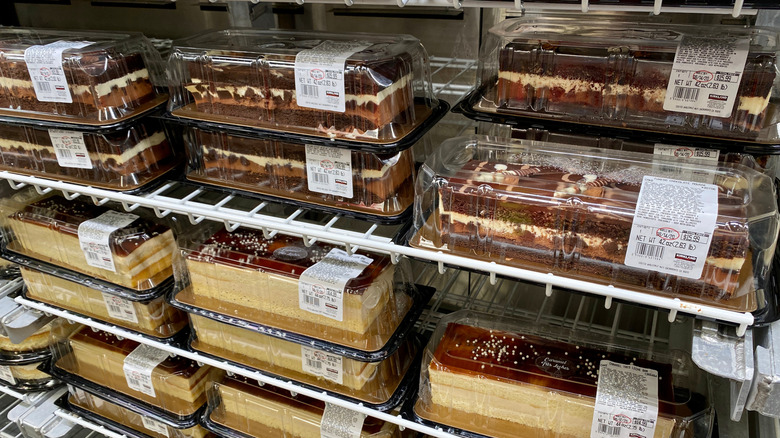 Costco bar cakes in refrigerated display case.