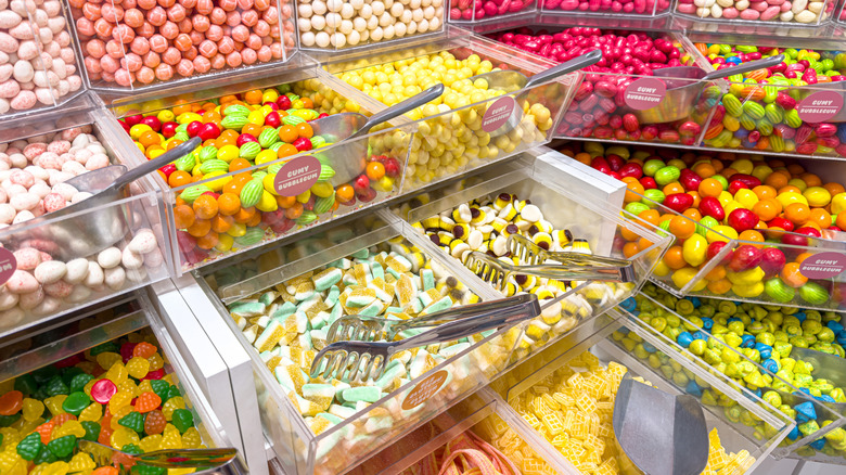 Assorted candies in plastic containers