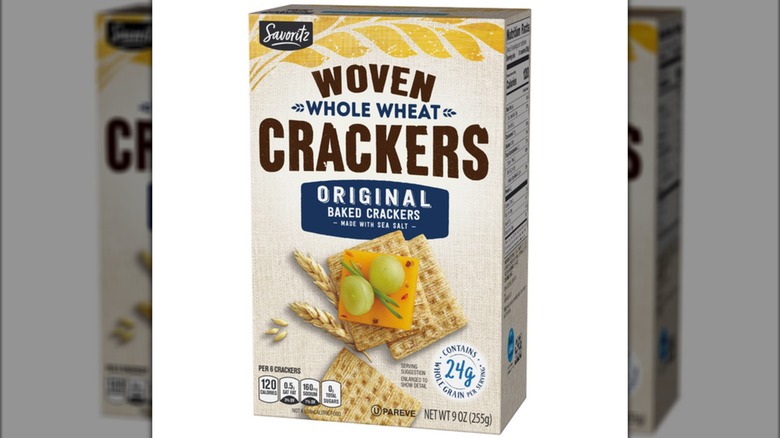 A box of the original flavor of Savoritz Woven Whole Wheat Crackers from Aldi on a white background.