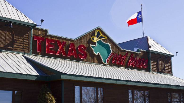 The exterior of a Texas Roadhouse location during the daytime