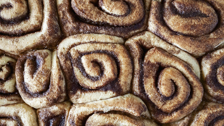 Tightly packed cinnamon rolls.