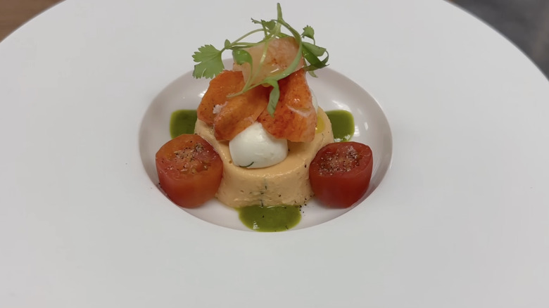 Lady Diana's favorite tomato mousse served on a white plate.