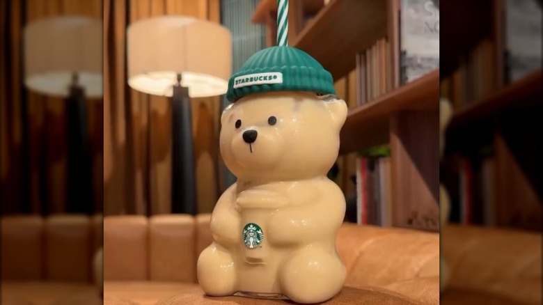 Starbucks Bearista cup full of coffee