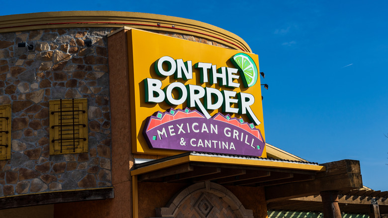 The exterior of an On The Border Location during the day with a clear blue sky behind it