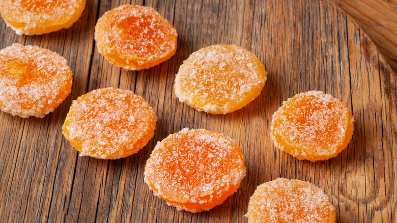 Cured or graved egg yolks on a wooden platter