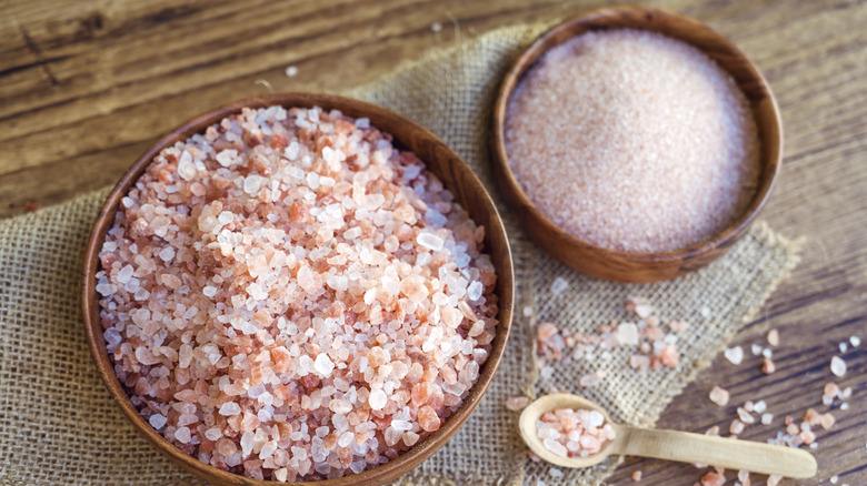 Bowls of coarse and fine Himalayan pink salt