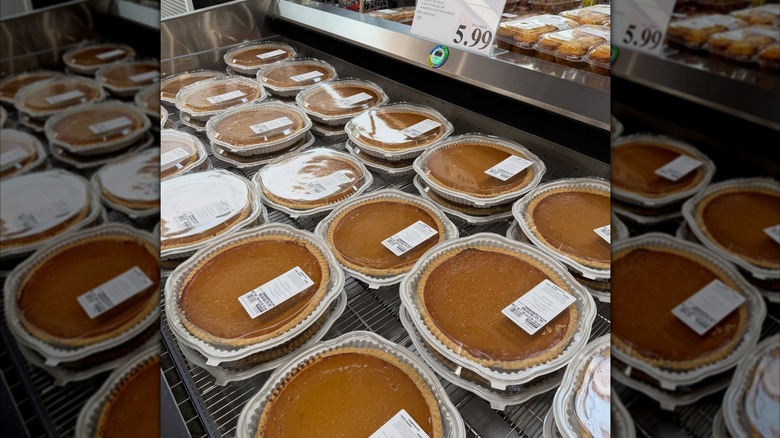 Various Costco pumpkin pies in refrigerated case