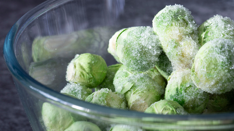 Frozen Brussels sprouts in glass bowl