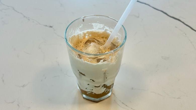 Diet Coke, marshmallow fluff, and ice in a glass