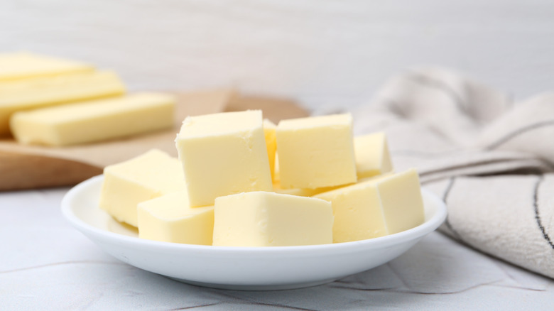 cubed butter on a small plate