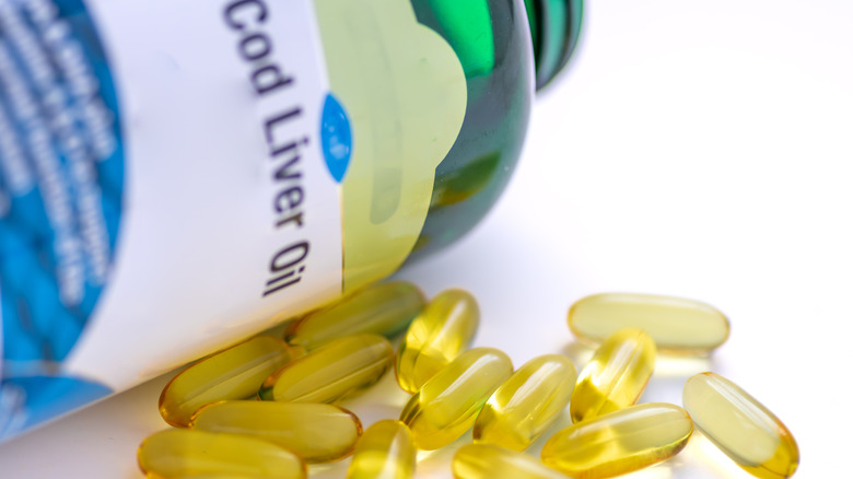 Cod liver oil capsules and bottle