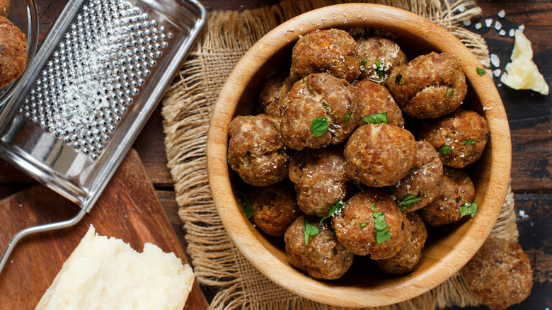 Top view of meatballs in wooden bowl