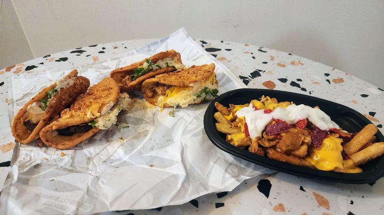 Taco Bell Chalupas and Nacho Fries on table