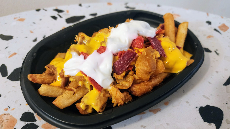 Taco Bell Caliente Cantina Chicken Nacho Fries on table