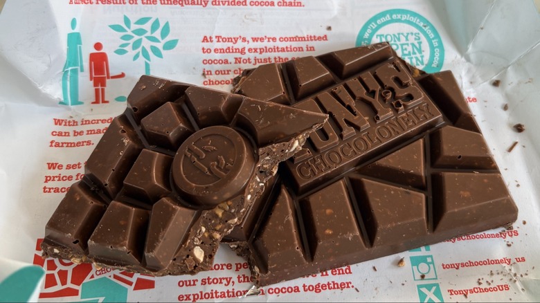 A Tony's Chocolonely Everything Bar broken in half