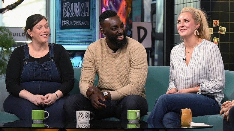 Sara Bradley, Eric Adjepong, and Kelsey Barnard Clark on the Build set