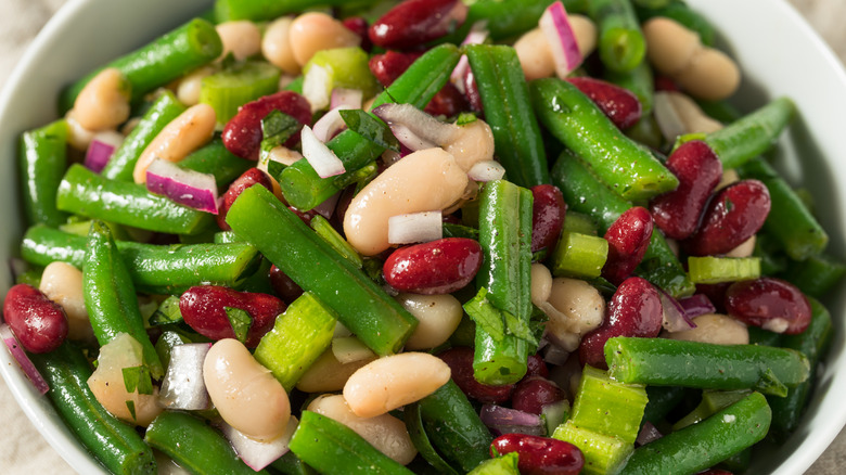 Closeup of salad with green beans, white, and kidney beans