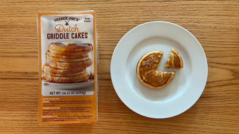 Container of Trader Joe's Dutch Griddle Cakes with one on a plate