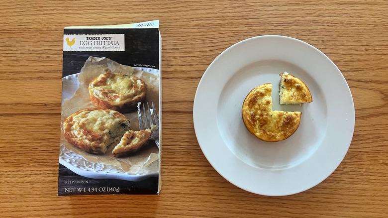 Trader Joe's egg frittata on a plate with a wedge cut out