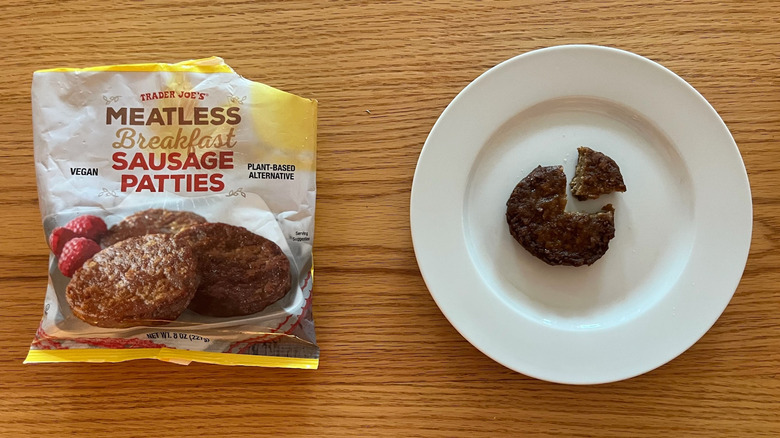 A bag of Trader Joe's Meatless Breakfast Patties with one on a plate