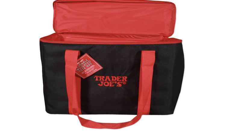 New red and black Trader Joe's insulated tote bag on white background