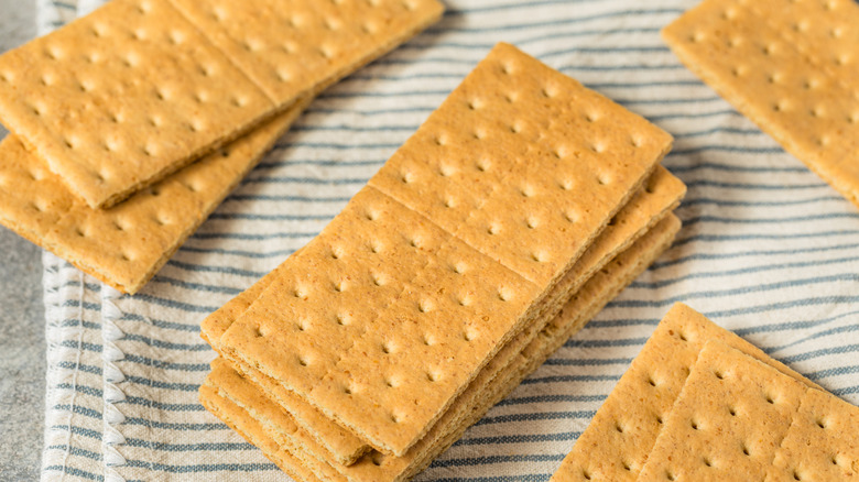 Stacks of graham crackers in different piles on cloth