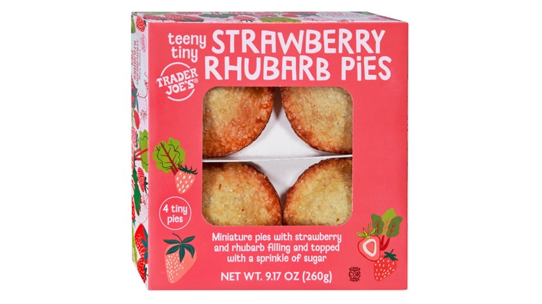 A pink and white box of the Teeny Tiny Strawberry Rhubarb Pies from Trader Joe's on a white background.