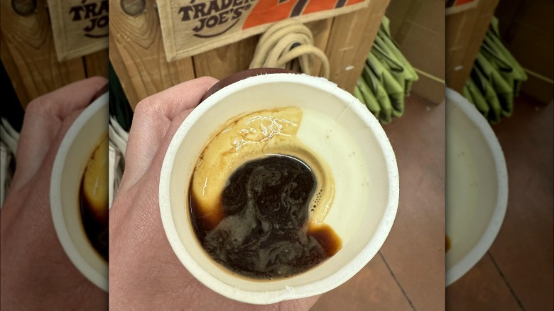 Hand holding Trader Joe's cup of affogato