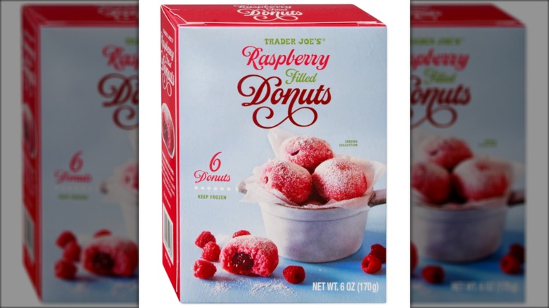 Box of Trader Joe's Raspberry Filled Donuts on white background